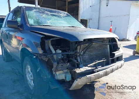 2004 Honda Pilot Lx z USA, uszkodzony, nr VIN 2HKYF18174H613357